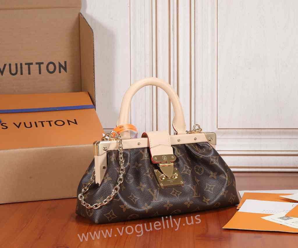 M46544 Monogram Clutch 28 M46544 Monogram Clutch 28