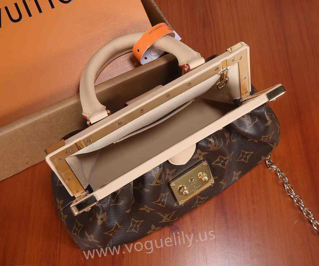 M46544 Monogram Clutch 28 M46544 Monogram Clutch 28
