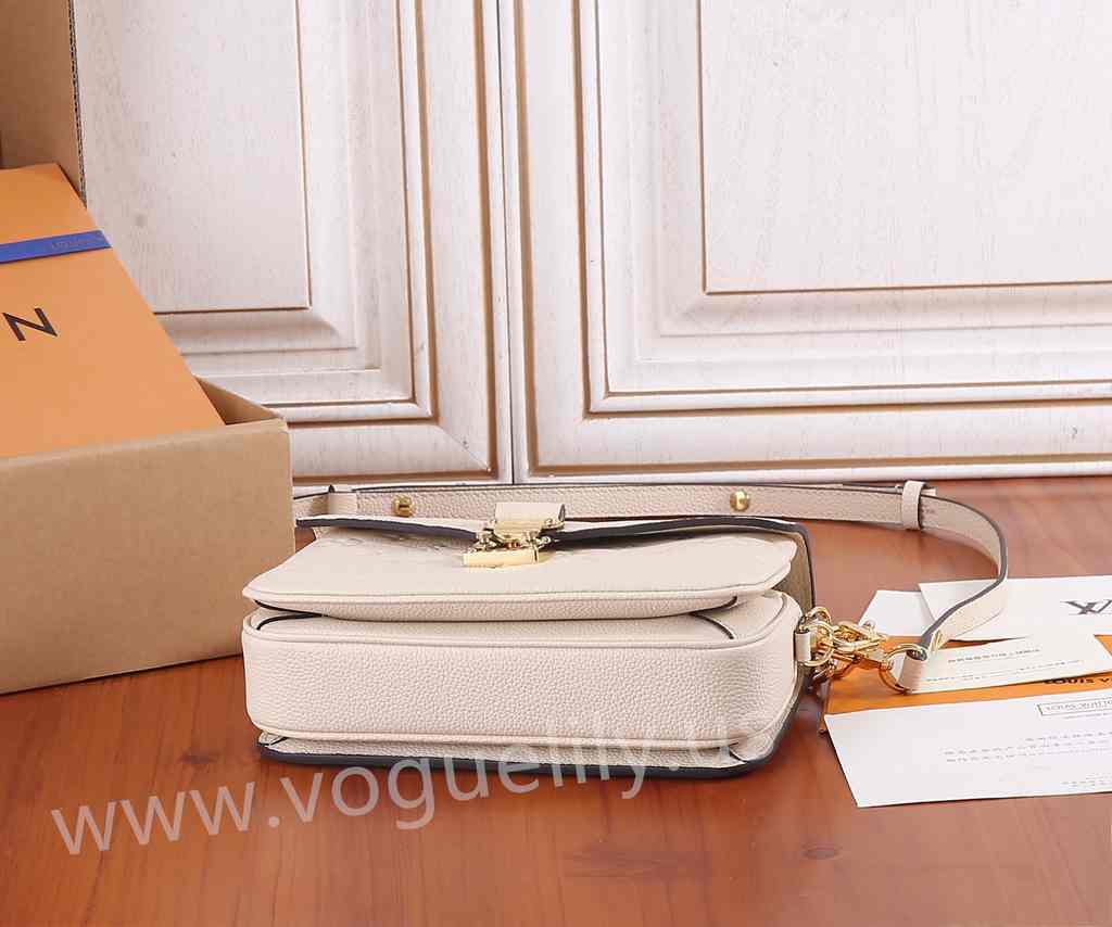 M22942 Pochette Métis East West 21