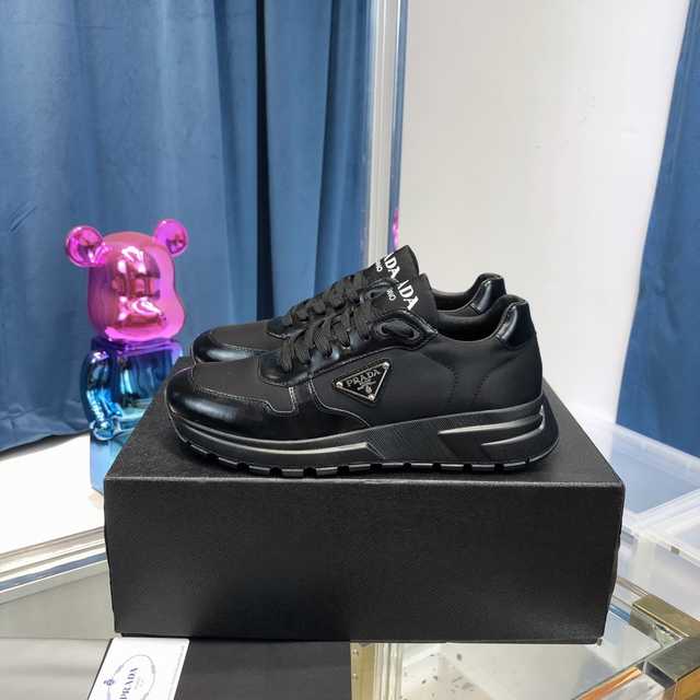 Prada metal tag